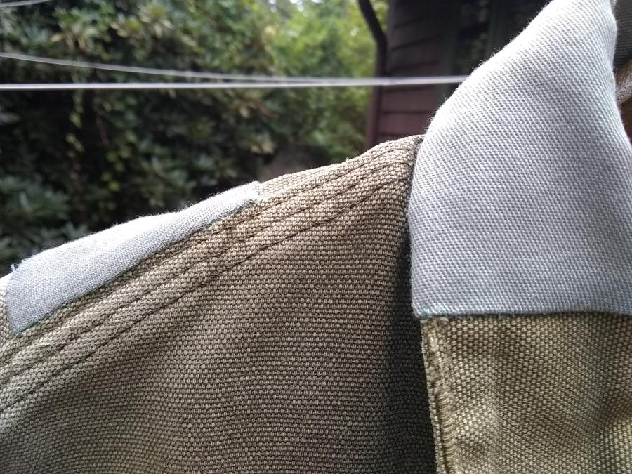 closeup of front collar and shoulder patch on Carhartt jacket