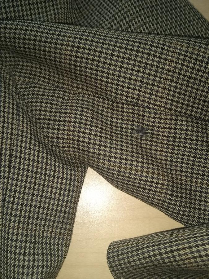 sport coat with rip by armpit