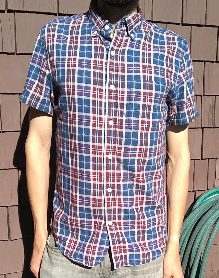 front view of man wearing short sleeve plaid shirt