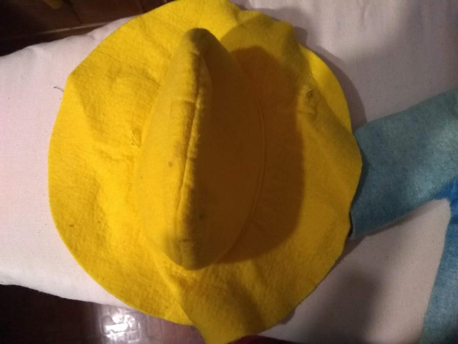 yellow Paddington Bear hat, slightly stained