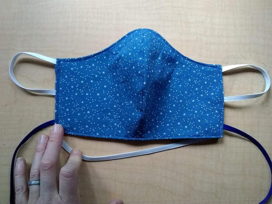 fitted mask in blue star print with elastic ear loops, extra elastic beard/neck loop, and cloth neck cord (blue)