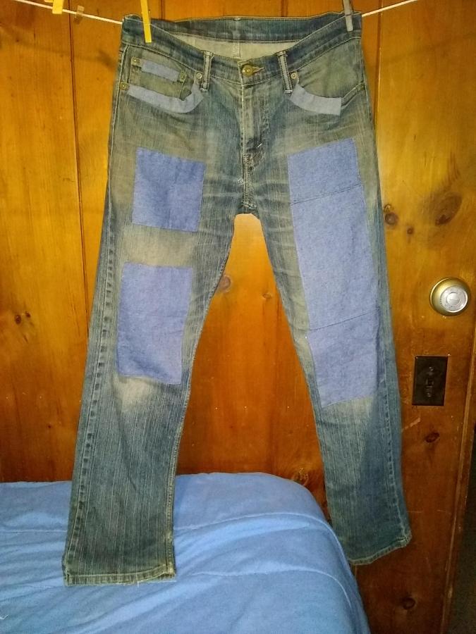 full length view of patched jeans