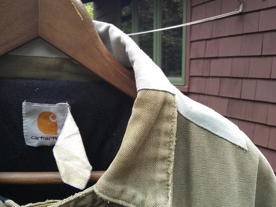 closeup front view of collar and shoulder patches on Carhartt jacket