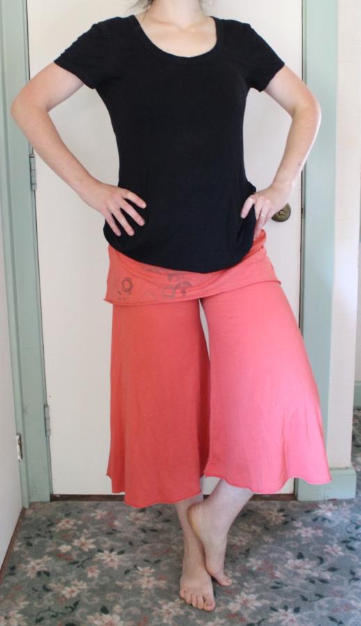 woman wearing pink gaucho pants, front view