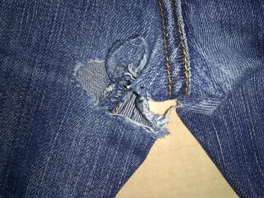 large holes in but/crotch of jeans