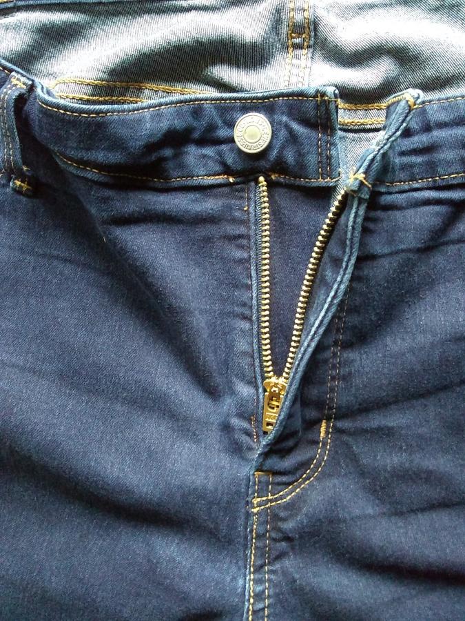 front of jeans, zipped down