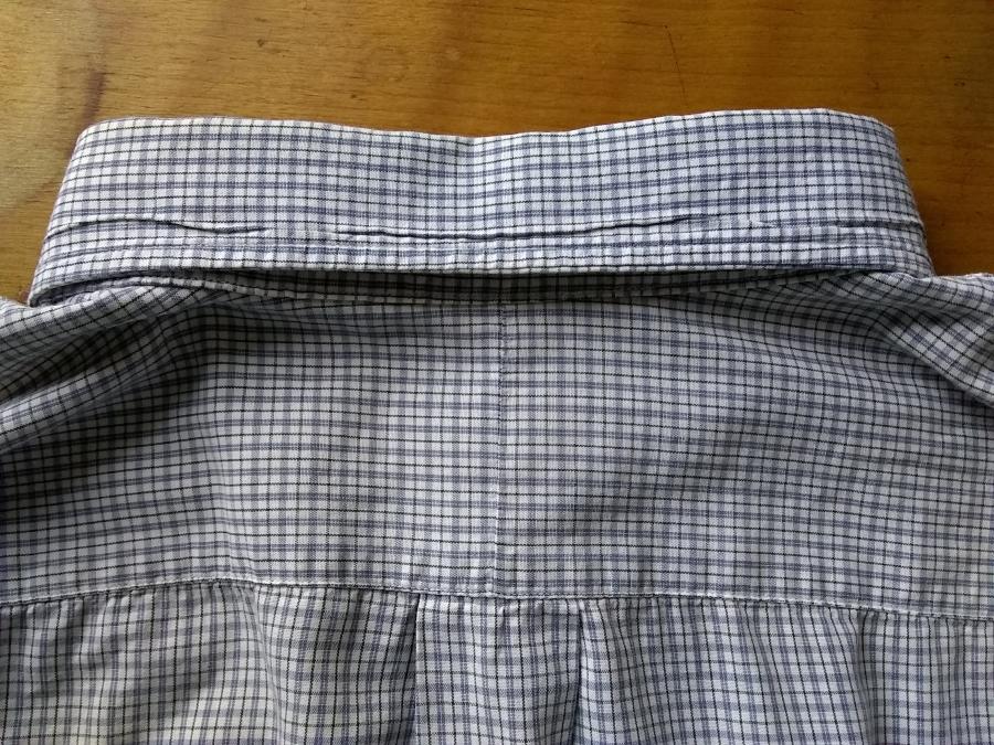 back view of collar of shirt, folded down, with no visible wear