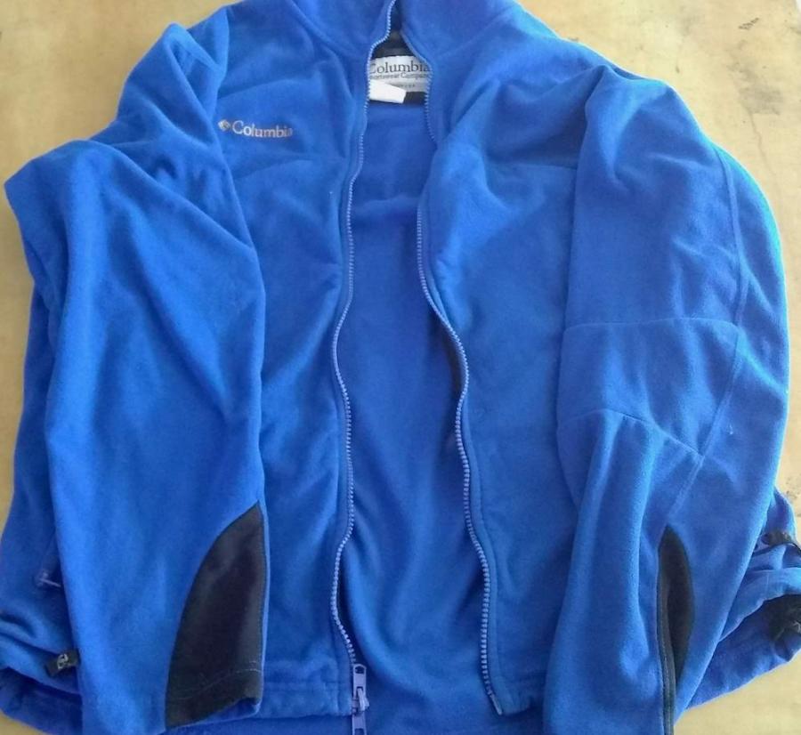 Blue fleece jacket, unzippped (zipper is broken, though you can't tell from image)