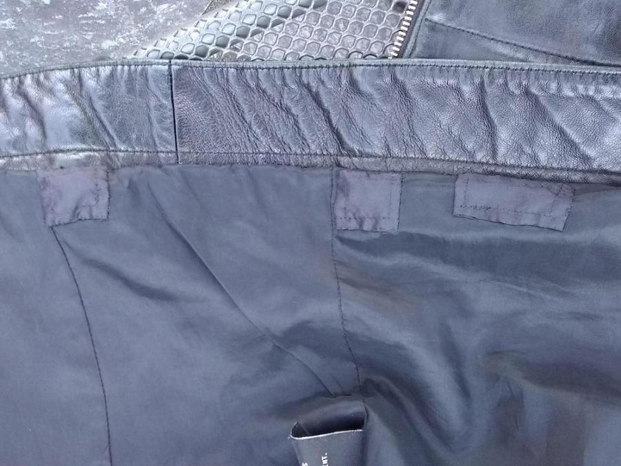 three small patches at the lining of jacket