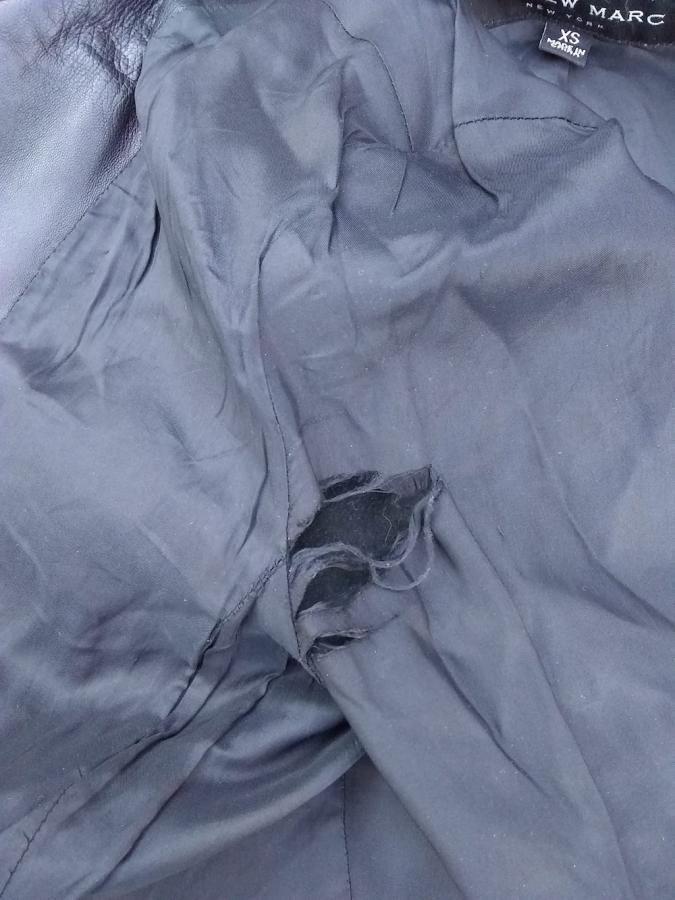inside of lining of jacket with hole in underarm